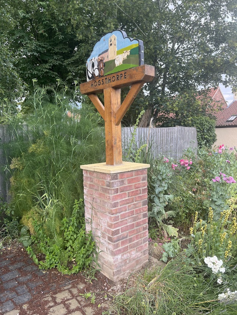 Village sign in Memorial Garden